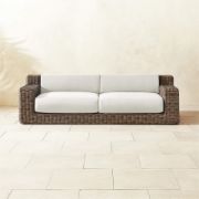 All‑Weather Rattan Outdoor Sofa with Warm White Cushions