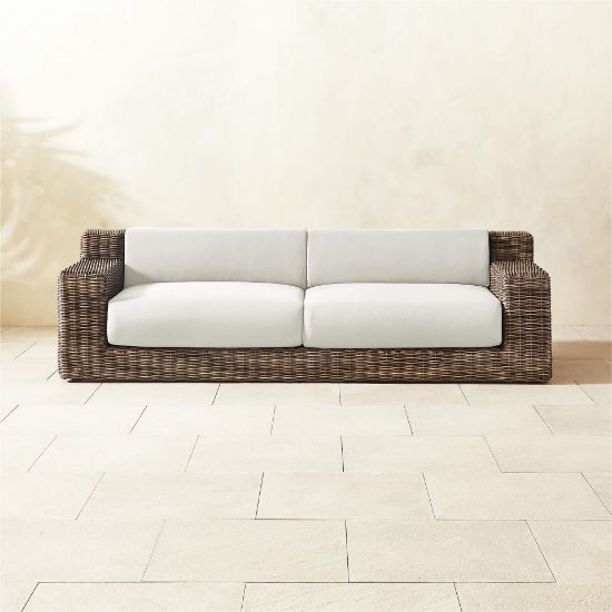 All‑Weather Rattan Outdoor Sofa with Warm White Cushions