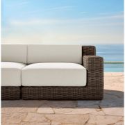 All‑Weather Rattan Outdoor Sofa with Warm White Cushions