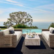 All‑Weather Rattan Outdoor Sofa with Warm White Cushions