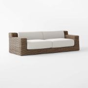 All‑Weather Rattan Outdoor Sofa with Warm White Cushions